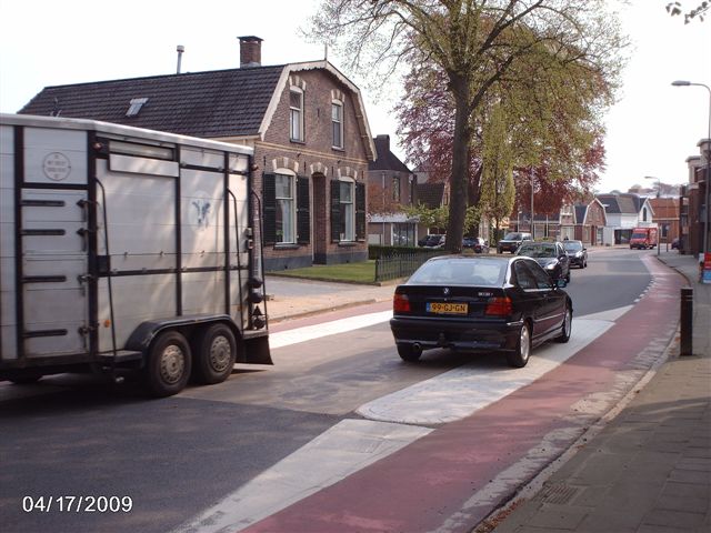 Wegversmalling dorpsstraat verwijderd triathlon 